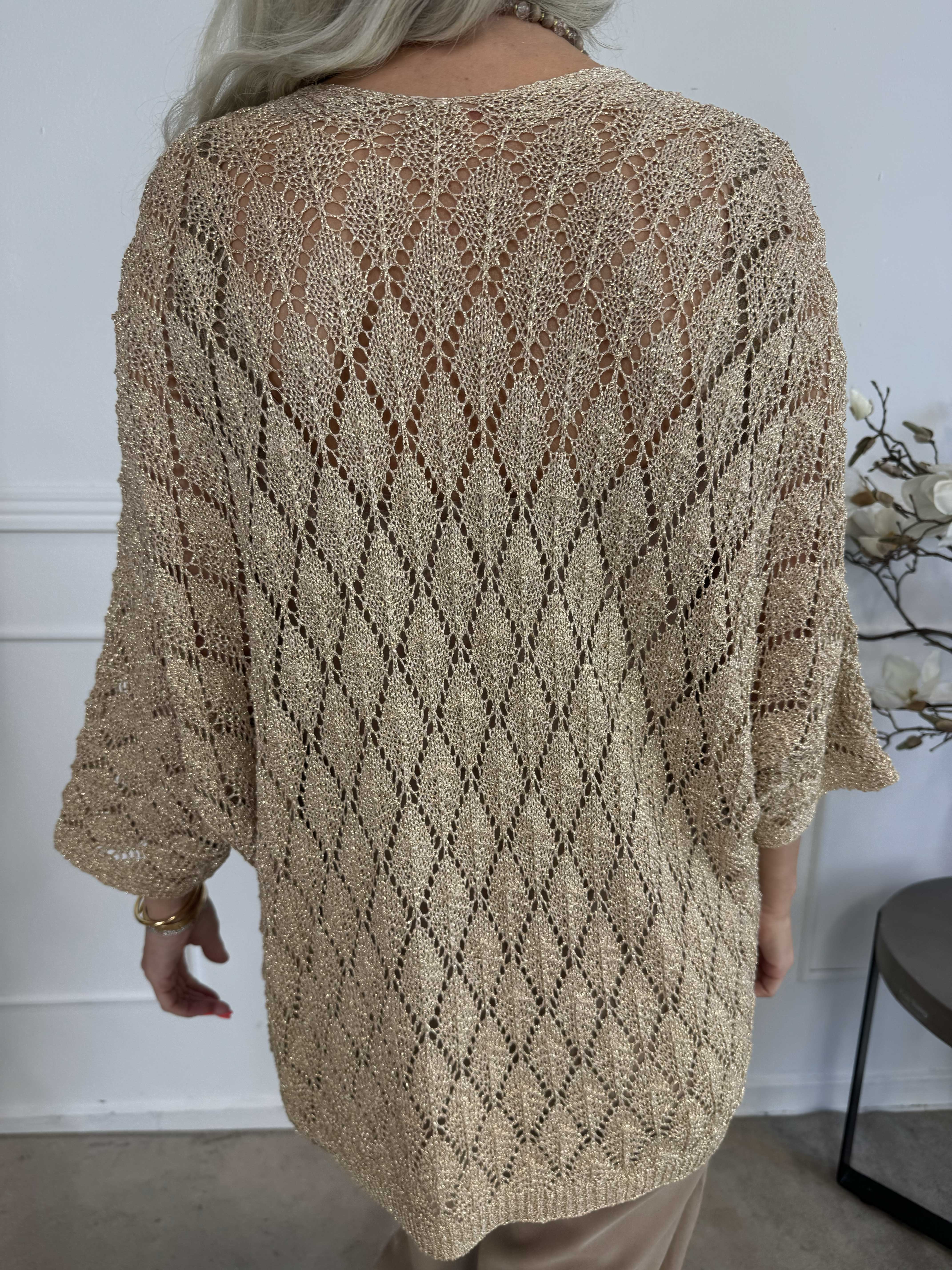 Selena - Söt virkad stickning med glittertrådar